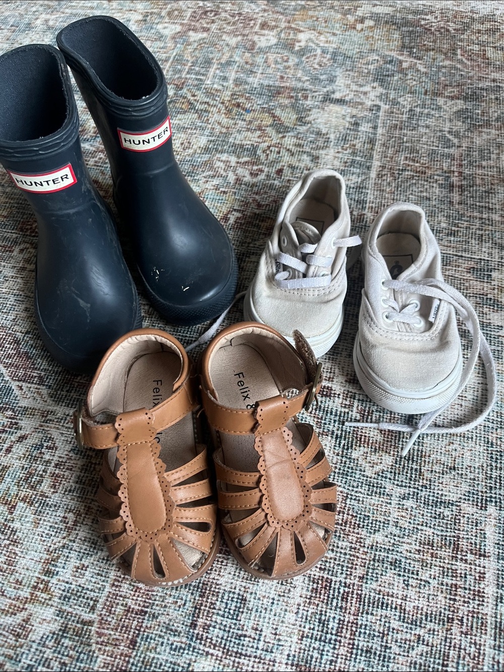 Hunter Kids Navy Rain Boots; Felix and Flora Tan Sandals; Vans Sneakers